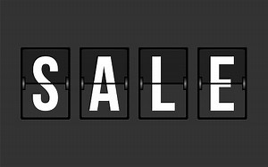Sale Sign on the Split-Flap Display on the Gray Background