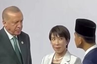 土耳其总统和印尼副总统交谈 高市早苗站两人中间 表情亮了_腾讯新闻