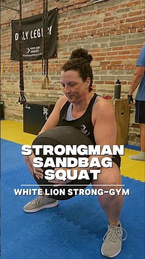 Strongman Sandbag Squats. Sandbag workout needed for strength. #sandbagworkout #functionaltraining