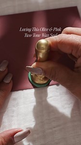 Dusty rose meets olive green 🩷💚 The perfect unexpected holiday pairing. We layered these two sealing wax colors and stamped with our Midwinter Monogram design for a sophisticated seasonal look. What's your favorite holiday color combo? | Artisaire