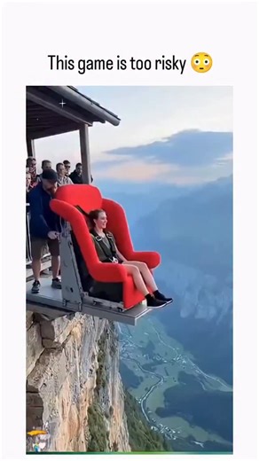 Entrepreneurialogy on Instagram: "The post shares a 60-second AI-generated video depicting extreme cliff jumps onto colorful inflatable mats, where participants bounce perilously high over valleys, sparking widespread reactions of shock and amusement with 1.4 million views. Fact-checks from December 2025 trace the footage to YouTube entertainment channels explicitly labeling it as artificial creations, debunking claims of real-life danger and highlighting its use for viral engagement. Thread rep