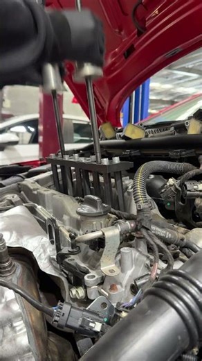 Fuel injector removal for 1.6L LWC Engine.