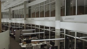 modern empty office, top view slow flight over workplaces