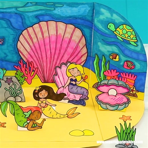 NEW this week - a super fun Mermaid small world to colour and make. When play is done, the ocean background folds away again, becoming an envelope to store the small parts. | The Craft Train