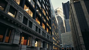 A bustling city street with towering skyscrapers
