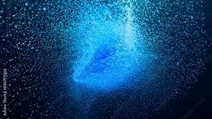 Blue particles burst and swirl, creating a captivating vortex in deep ocean waters. Dynamic movement and vibrant colors make for stunning visual effects Stock Video