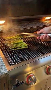 Quick and simple grill recipe for two. Reverse seared pork chops and asparagus.