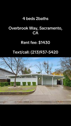 Beamed vaulted living room ceiling with floor-to-ceiling windows and a fireplace. Kitchen features floor-to-ceiling windows, stone countertops, backsplash, and large island. Tiled walk-in shower in bathroom with spa-like feel. Open floor plan with fenced backyard, patio, and wooden deck. Two-car garage with extra driveway parking, walk-in closet, and laundry. #sacramento #apartmenthunting #apartmentforrent #california #realestate