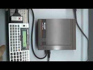 Sharp PC 1403H with pocket disk drive CE-140F