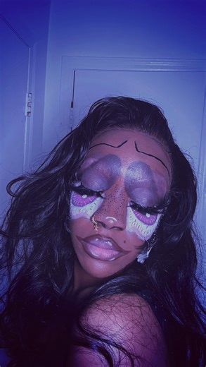 AWOO🌎💜 on Instagram: "LAUGHING ALL THE WAY TO THE BANK🖤 #awoosworld #mua #spookyseason #halloween #halloweenmakeup #31daysofhalloweenmakeup #transitionreels"