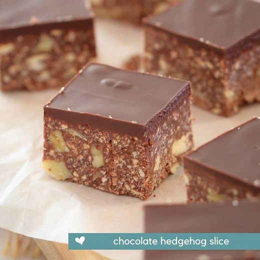 A quick and easy classic dark chocolate HEDGEHOG SLICE made with crushed biscuits, walnuts, coconut and condensed milk... the perfect melt and mix slice! Recipe: https://bakeplaysmile.com/chocolate-hedgehog-slice-no-bake/ | Bake Play Smile