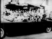United States Presidential motorcade traveling through downtown...