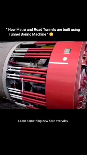 education on Instagram: "A Tunnel Boring Machine (TBM) builds metro and road tunnels by cutting through soil or rock with its rotating cutter head. As it moves forward, conveyors carry the excavated material out of the tunnel. Behind the cutter head, the machine installs strong concrete segments to form the tunnel wall. Hydraulic jacks push the TBM forward while keeping the tunnel stable. This method is fast, safe, reduces surface disturbance, and works efficiently even deep underground. . . . .