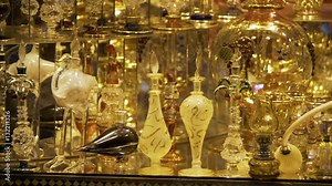 Bottles of Essential Oils used in Perfume Making Displayed in a Row