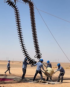 Insulator hosting 380KV line, A monster in transmission line. #facebook #video #work #community #thankyouforwatching | Electrical Transmission line