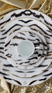 Give your table an opulent touch with this Tiger tableware collection from Roberto Cavalli Home. Perfect for special occasions, the range is crafted from fine bone china and finished with gold detailing. : Roberto Cavalli #RobertoCavalli #FineBoneChina #LuxuryDining | AMARA Living | Facebook