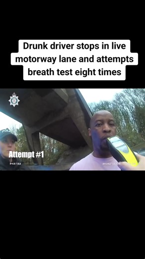 Drunk Driver Stopped on Motorway Attempts Breath Test
