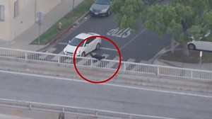 Police chase driver ditches car, hides in Long Beach