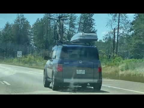 Passing scenic view of Idaho highway toward Seattle