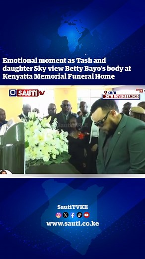 Betty Bayo’s husband Tash and daughter Sky share an emotional moment as they view her body at Kenyatta Memorial Funeral Home. | Sauti TV