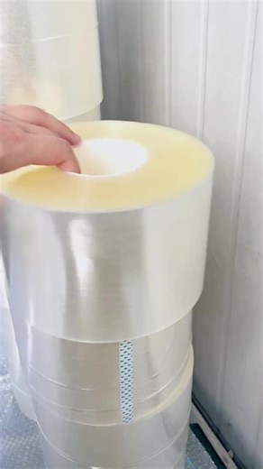 Factory Secrets: The Making of Ultra‑Quiet Packing Tape Ever wondered how our silent packing tape achieves zero‑noise peeling? From premium BOPP film & special acrylic glue, corona treatment, precision coating, infrared drying, silicone release layer, cooling curing to accurate slitting — every step is strictly controlled. With unique embossed surface & shock‑absorbing adhesive layer, it peels ultra‑quietly, sticks strong and leaves no residue. Perfect for night‑time packing, office use and e‑co