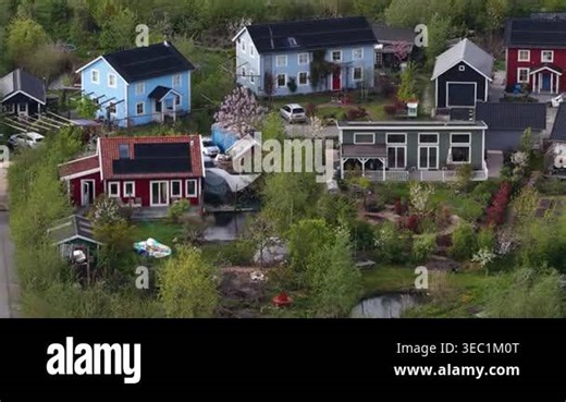 Sustainable wooden houses in Ecovillage Bolderburen, Almere, featuring green living, private gardens, ecological community life and nature in the Netherlands Stock Video Footage - Alamy