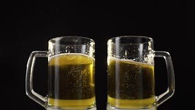 Clinking Beer Mugs with Light Golden Beer in Slow Motion, Drinking Beer with Friend, Bubbles in Beer, Cheers, Beer Pub Stock Video - Video of clink, celebrate: 142435643
