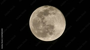 Night and full moon, full moon shining in dark sky, very close-up full moon video in 4k quality,
