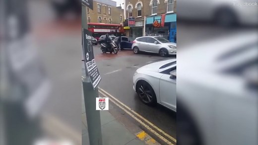 Motorist attacks moped driver with hammer in London road rage battle