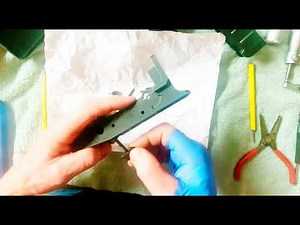 VZ 61 Scorpion. Installing the bolt release, magazine release, and the ejector.