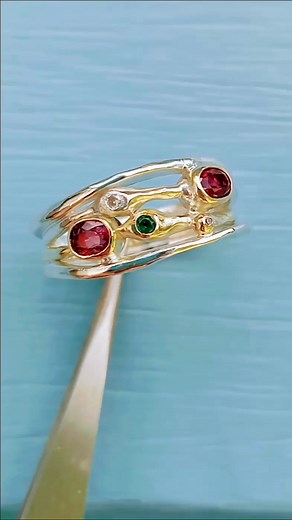 103 reactions · 16 comments | Two tone ruby, emerald and diamond made using clients stones out of old rings #handmadejewellery #unusualjewellery #unique | Sally Fisher Jeweller | Facebook