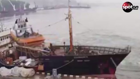Tug rams fishing boat - and just turns around