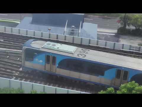 Miami Metrorail Northbound Green Line train departing at Dadeland South Station.