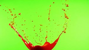 Download Orange Liquid Splash Against green screen background. for free