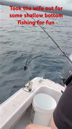 Shallow bottom fishing with the wife, outside of Hilo Breakwall