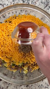 Juicy ground beef, sharp cheddar, and bold pickles rolled into one crispy, craveable bite. Tag a fusion-lover. | Beef Loving Texans