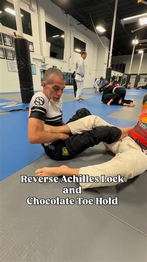 Sunrise Submissions | Jiu Jitsu on Instagram: "Here is the final Sunday Submission of 2025: A friendly Reverse Achilles Lock and “Chocolate” Toe Hold demonstrated by Coach @its_just_fish_original 🙏 Thanks for always keeping the doors open and for sharing your knowledge with the @sunrisesubmissions crew @sdbjj What a year for everyone who dared to face the mat before dawn. 💪 Amazing Work from all👏Let’s keep the energy flowing into 2026 OSS #sunrisesubmissions #alwaysbechoking #earlyrisers #dri