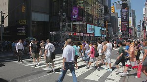 People walking across the road - Free Stock Video