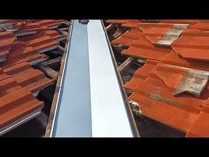 How to replace a rusted Valley gutter on a tiled Roof.