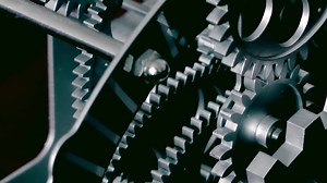 Download Abstract Industrial Clock Gears Close Up for free