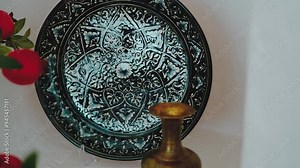 Uzbek culture. Dastarkhan (from the Persian "dostur" - tablecloth and "khan" - treat) is a generalized name for the traditions of Central Asian hospitality. It is also the name for a low table of squa