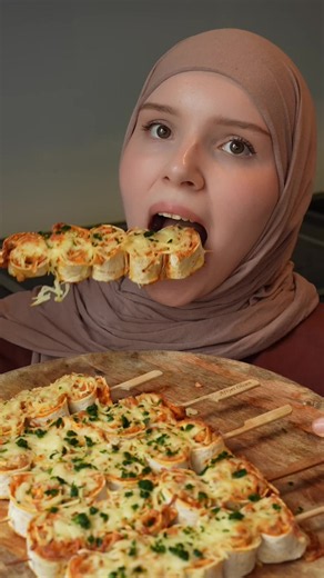 Lavash Rolls with Sausages and Cheese Ingredients: - 3–4 lavash breads - 3 sausages - Cheese (for the filling and topping) - Philadelphia cream cheese - Ketchup or tomato paste - Garlic to taste - Spices to taste Instructions: Take 3 lavash breads. Grate 3 sausages on a coarse grater, add grated cheese, Philadelphia cream cheese, spices, ketchup or tomato paste, and garlic to taste. Mix everything well until combined. Spread the filling evenly over the lavash, roll it up tightly, and cut it into