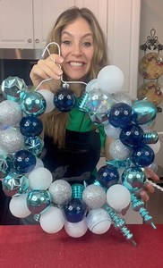 she turned a wire hanger into a Christmas wreath she turned a wire hanger into a Christmas wreath amazing arts & crafts DIY video shows how to turn an old wire hanger into an ornament wreath masterpiece for the holidays! this original video was produced by rick lax productions and brooklyn b | Home Hacks & Easy Snacks