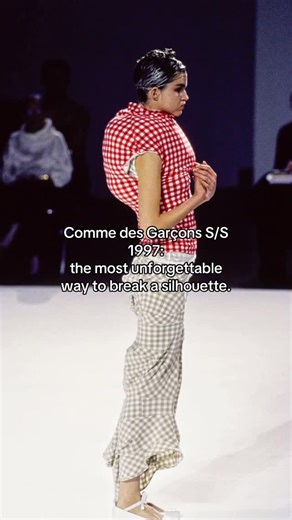 Various Archives on Instagram: "Comme des Garçons Spring/Summer 1997, titled Body Meets Dress, Dress Meets Body, is the collection that broke the silhouette on purpose. Often remembered as “Lumps and Bumps”, it takes something as “sweet” as gingham and turns it into a body you cannot predict or control. Rei Kawakubo built the looks around strategic padding and inserts placed across the body (abdomen, hips, back, shoulders), creating swollen, off-balance volumes inside tight, tubular dresses and 