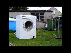 washing machine destroyed with a brick