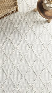 Add a touch of natural beauty to your bedroom with the stunning Hush rug. Hand-loomed in India, this rug features a striking diamond pattern on a contrasting backdrop, creating a soft and dense underfoot feeling. Available in various sizes, it's the ultimate piece to bring your room together. | Snooze