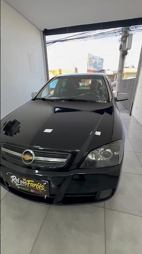 Astra headlight replacement with black mask.