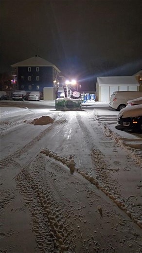 Tractor Snow Blower Removing Parking Lot Snow