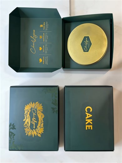 Our signature Chocolate Smash Cake, crafted with rich chocolate layers, finished in a luxurious golden container, and presented in our premium gift box — because every celebration deserves elegance. Tap to order and make it special. #ChocolateSmashCake #LuxuryDesserts #PremiumGifting #ChocolateLovers #DessertGoals #GoldenCake #GiftInStyle #HandcraftedDesserts #ChocolateArt #CelebrateSweetly #CocoaLove #DessertLuxury