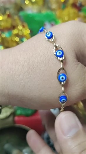 evil e ye protection charm bracelet with wallet charm